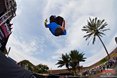 Kundai Murapa spots his landing as he flips off the stage during his style run of the parkour competition at the Mr Price Pro Ballito 2013 beach festival.