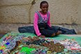 Portia Khumalo (Salt Rock) showing off some of her amazing bracelets and necklaces on sale here at the Mr Price Pro Ballito Beach Festival 2013