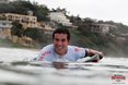 Ramzi Boukhiam (MAR) smiling despite a beating from the ocean.